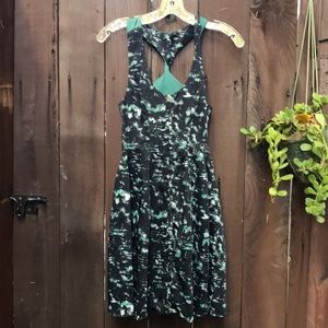 BCBG twist back green and black dress